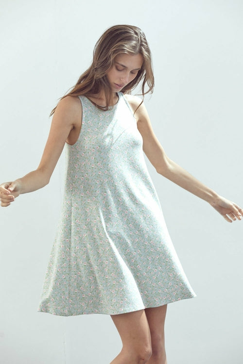 Robe courte trapèze sans manches en maille fleurie marguerite