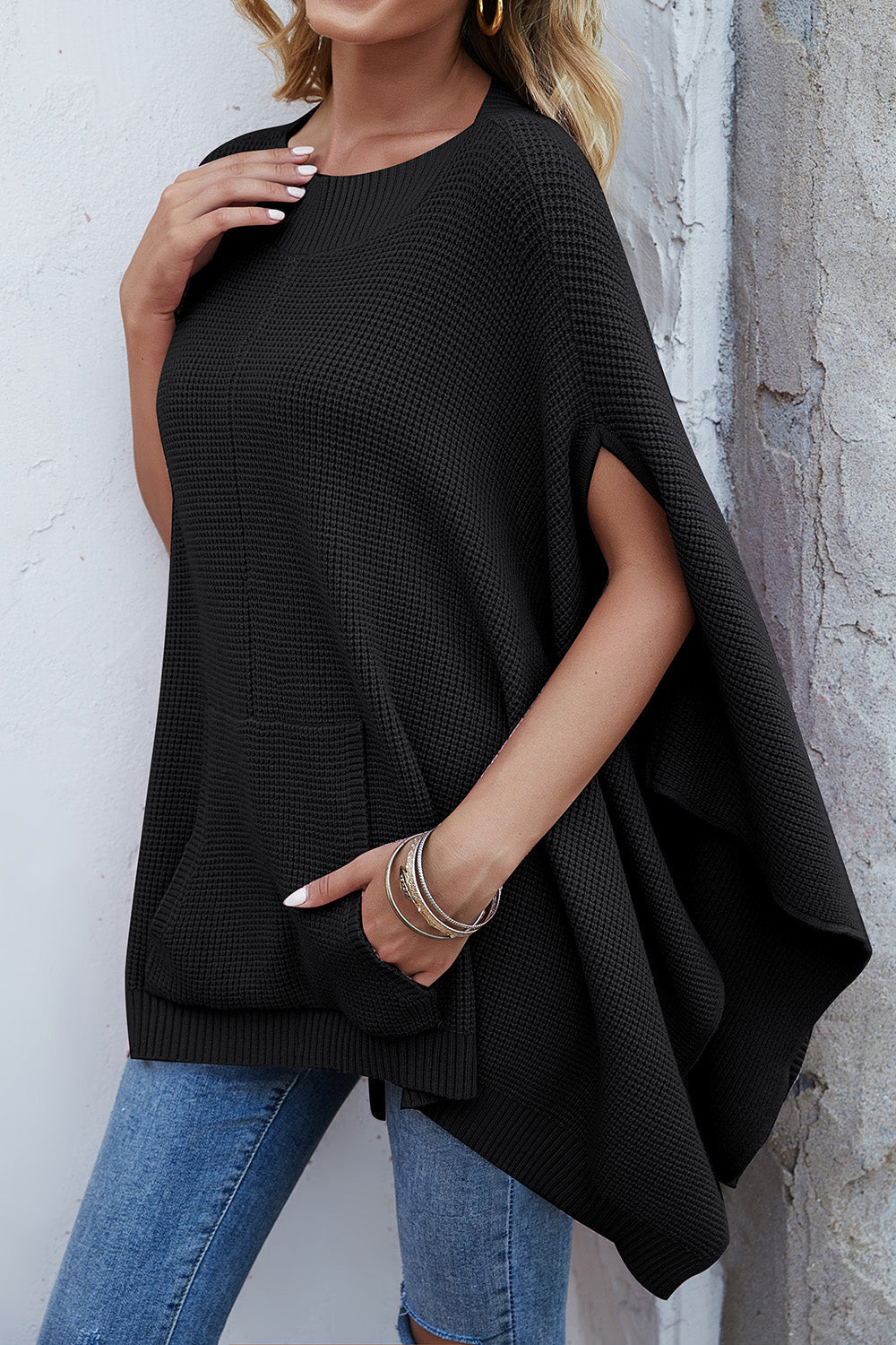 Pull à manches cape et poches en tricot gaufré