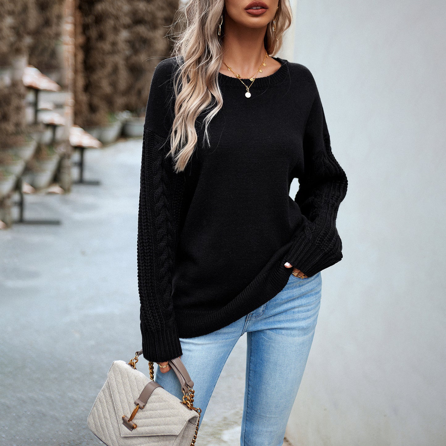 Suéter sencillo de cuello redondo de moda para mujer