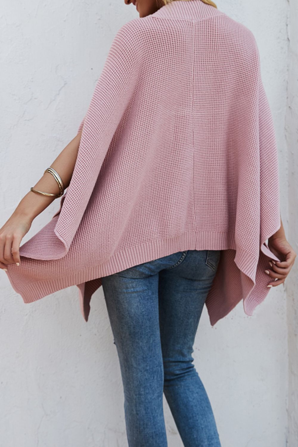 Pull à manches cape et poches en tricot gaufré