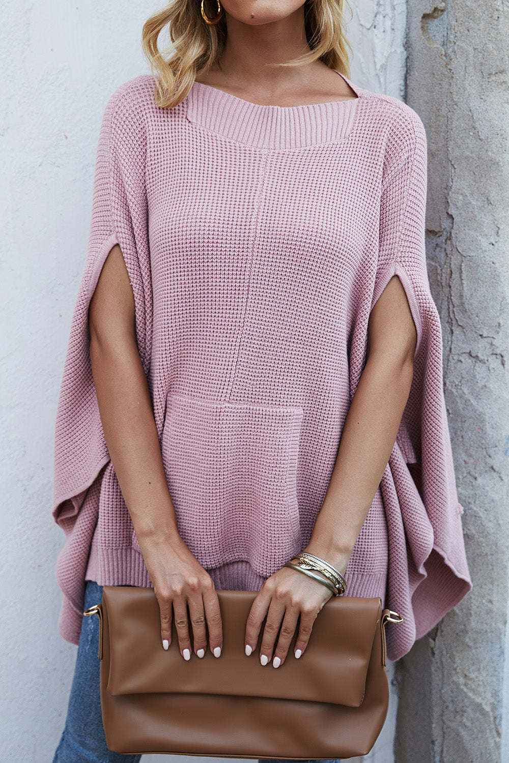 Pull à manches cape et poches en tricot gaufré
