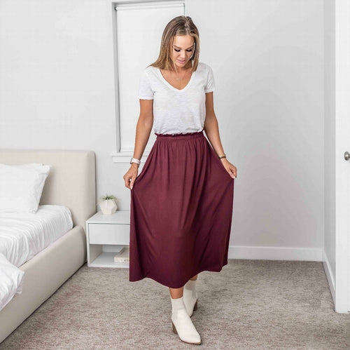 Falda midi con cintura paperbag y bolsillos