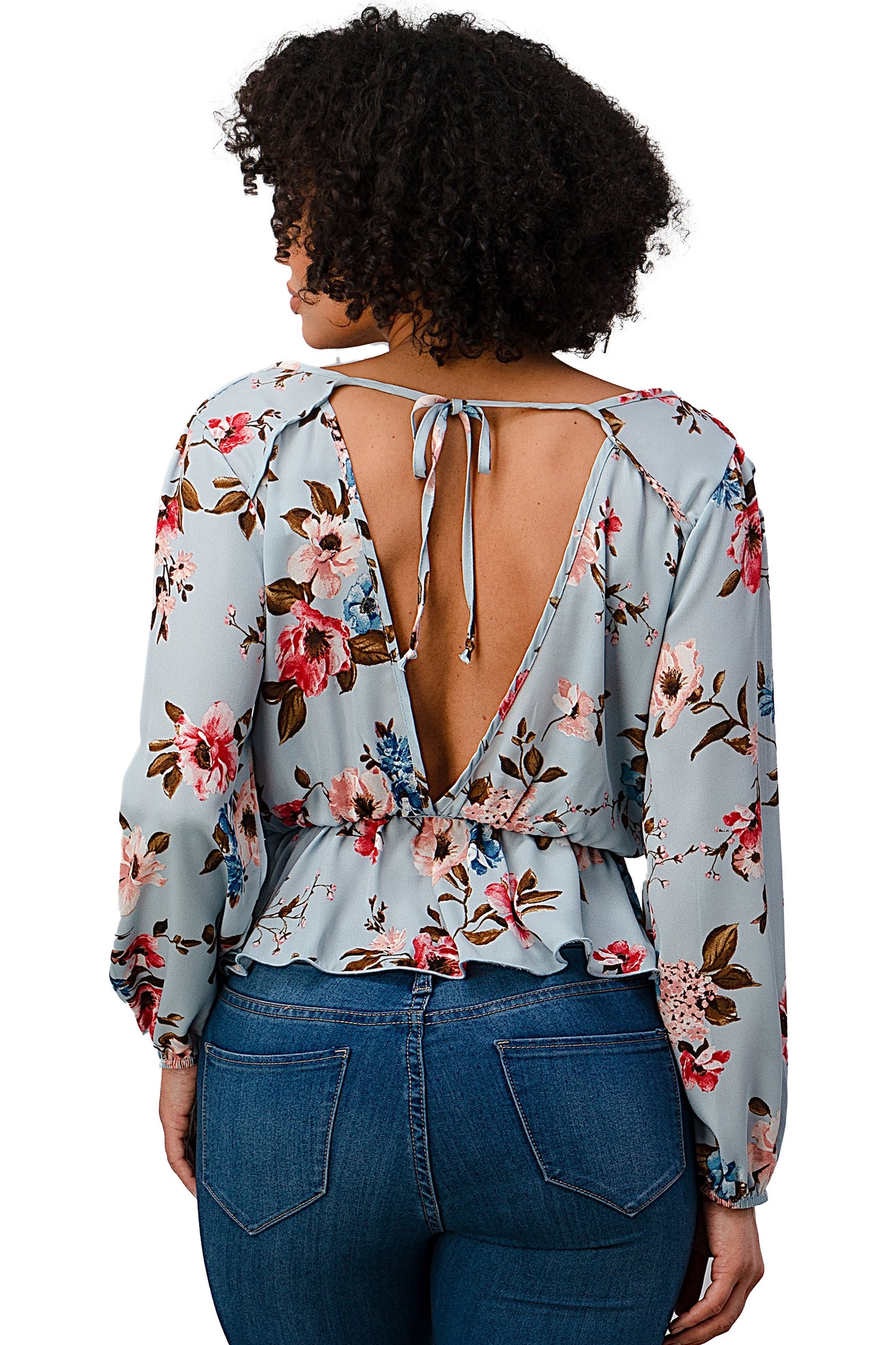 Blusa con dobladillo peplum y sobrepelliz estampada