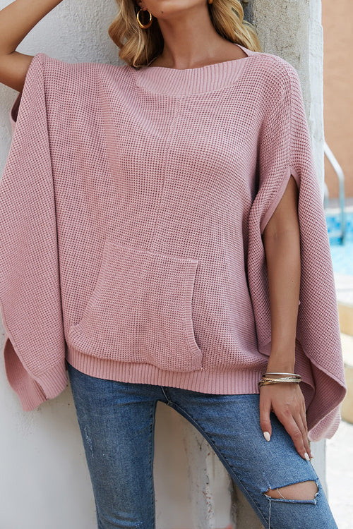 Pull à manches cape et poches en tricot gaufré