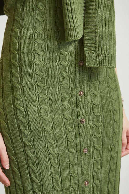 Robe en tricot sans manches et robe pull longue de Rose Paulino