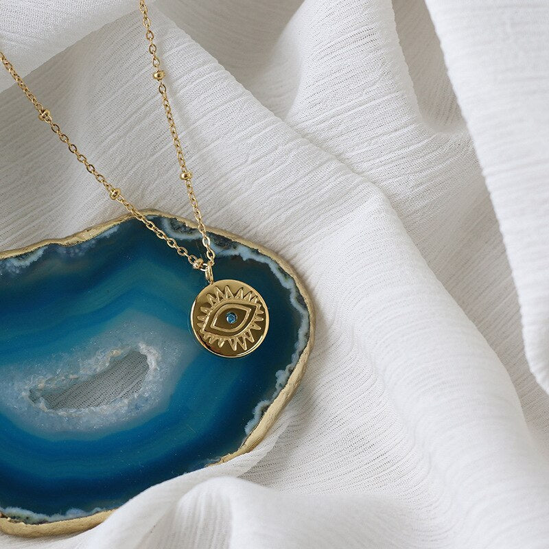 Collar de monedas de mal de ojo azul