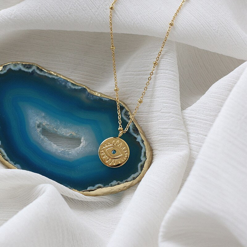 Collar de monedas de mal de ojo azul