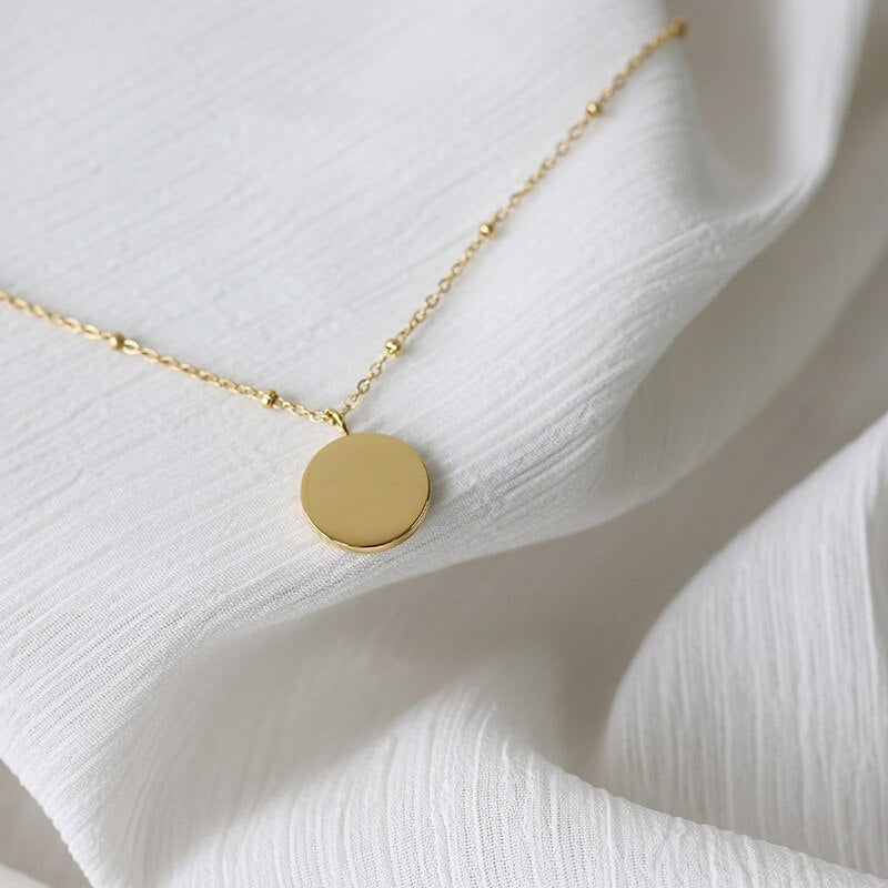 Collar de monedas de mal de ojo azul