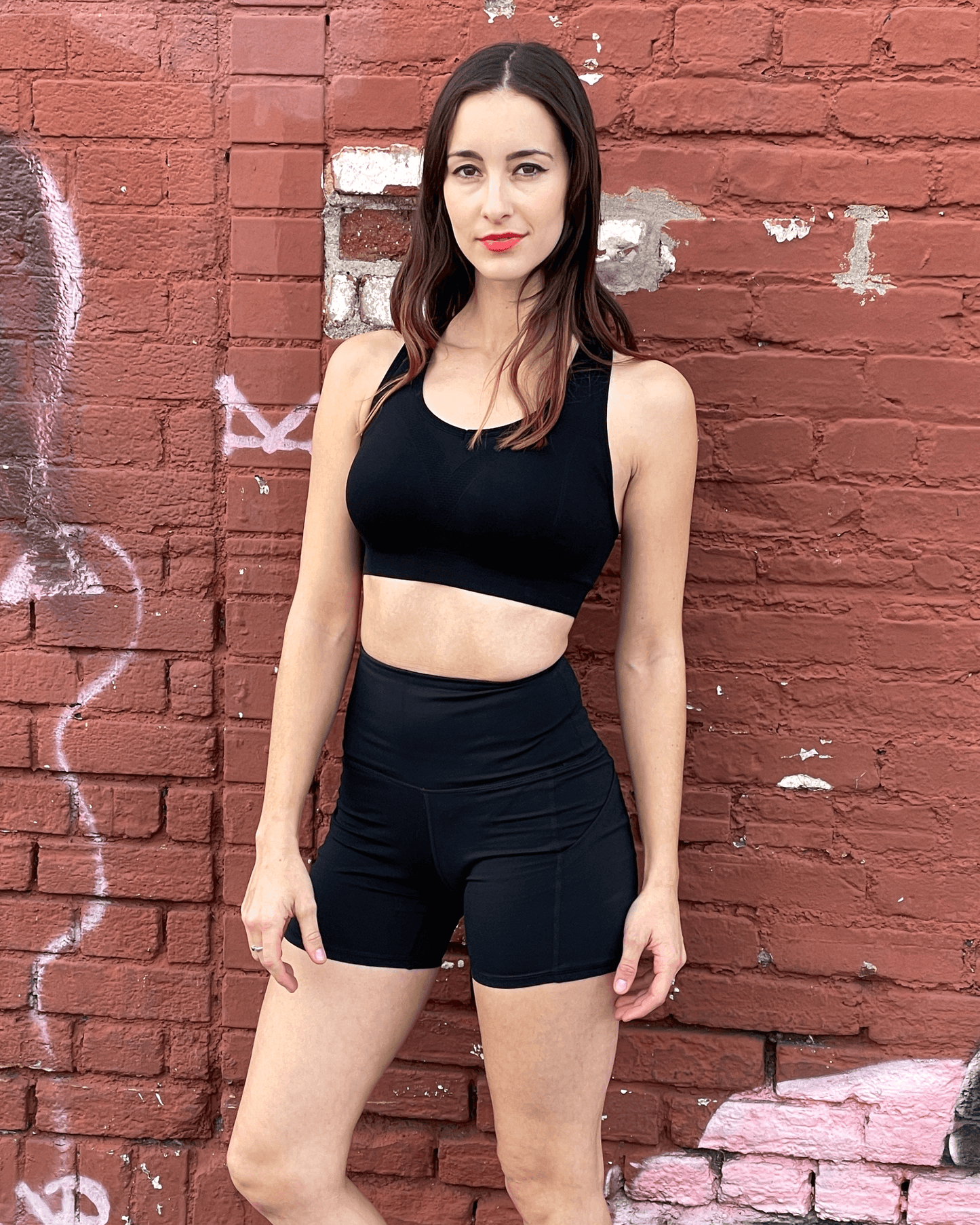 Jolie short de sport taille haute avec poches sur les hanches