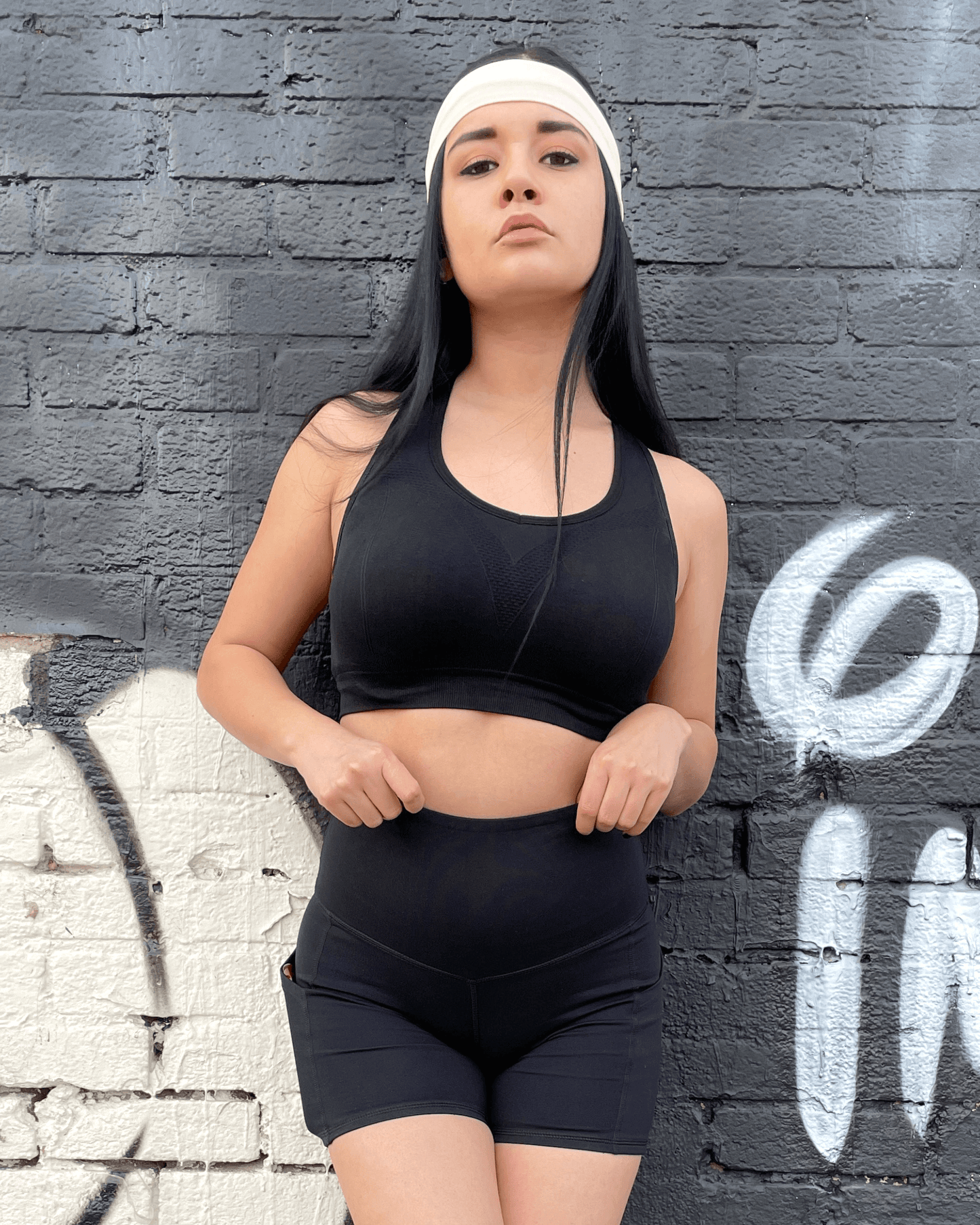 Jolie short de sport taille haute avec poches sur les hanches