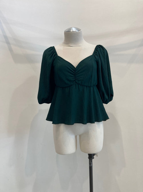 Blusa peplum fruncida