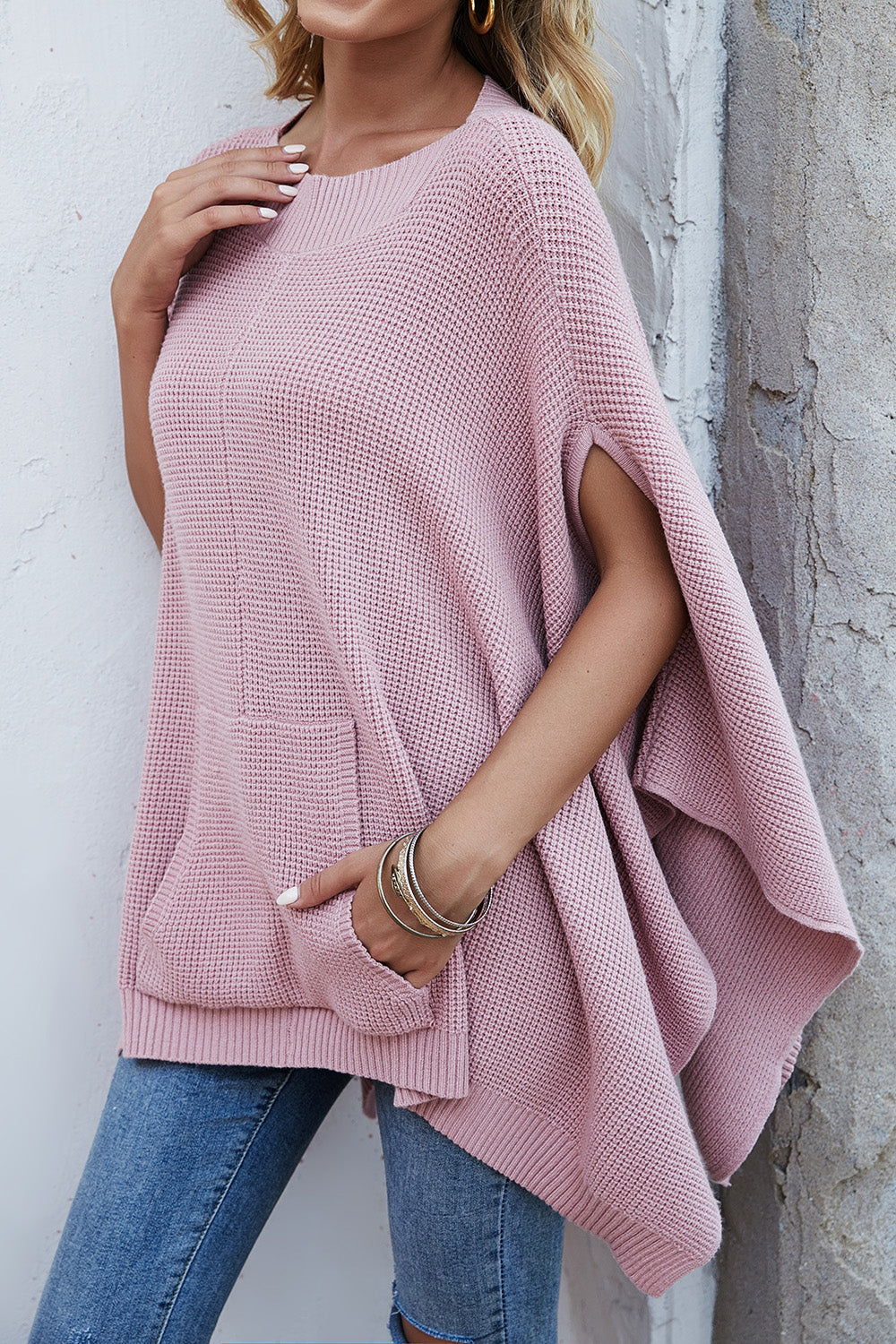 Pull à manches cape et poches en tricot gaufré