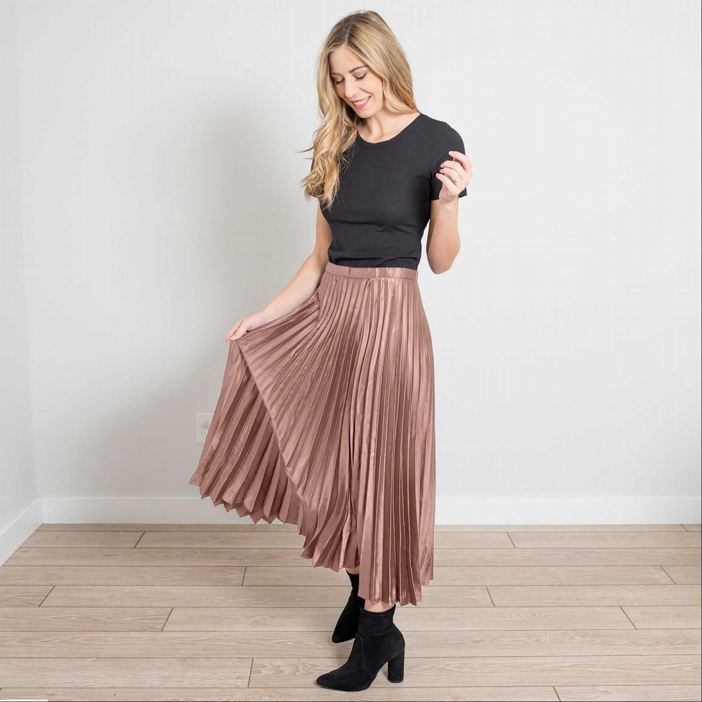 Falda midi de seda plisada con cremallera lateral