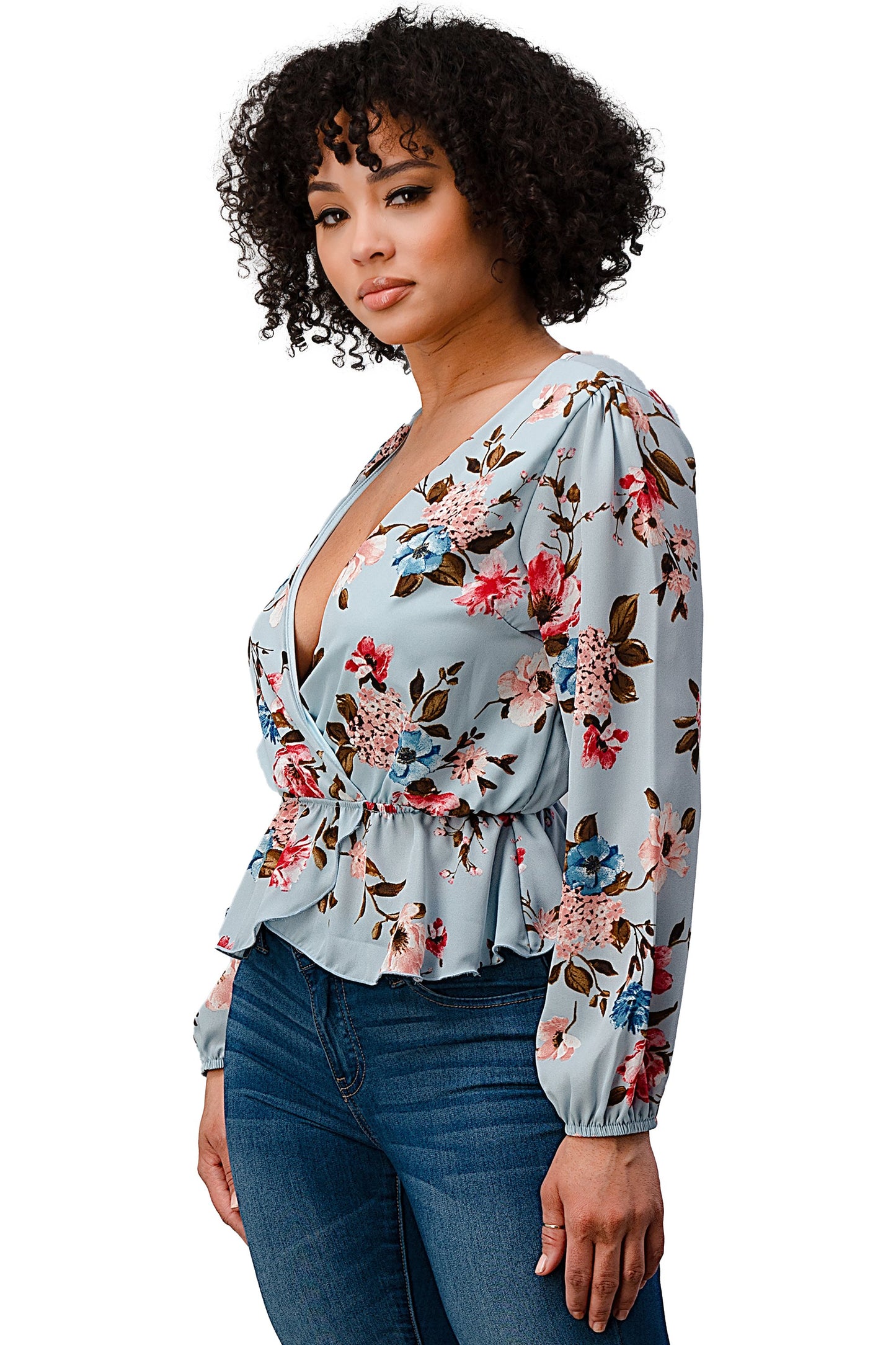 Blusa con dobladillo peplum y sobrepelliz estampada