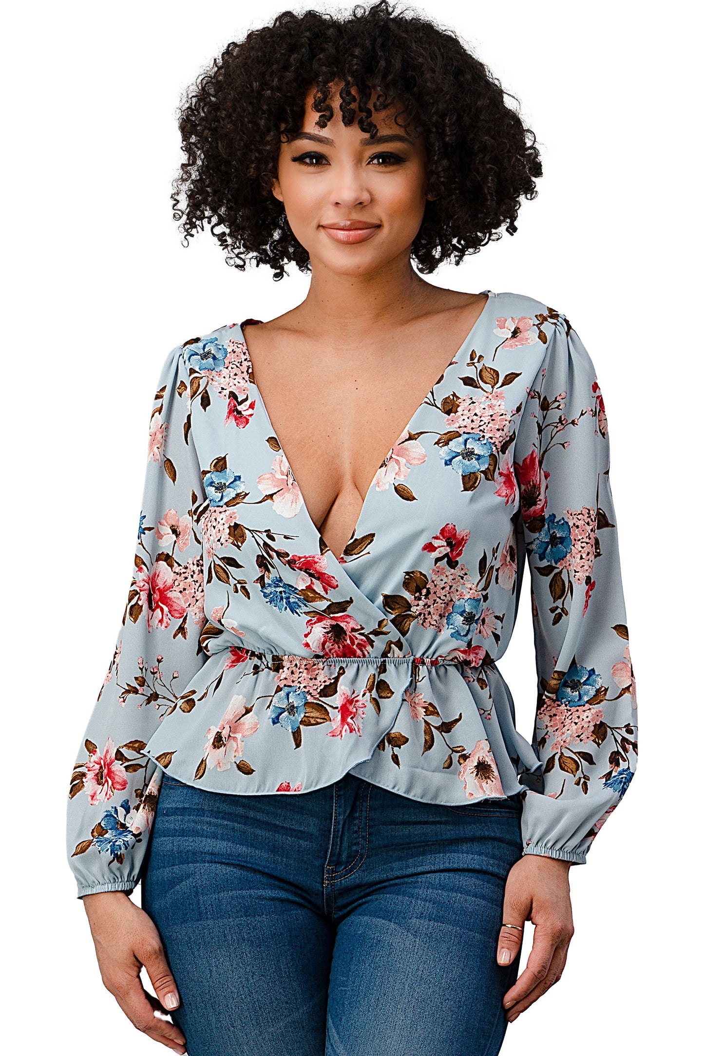 Blusa con dobladillo peplum y sobrepelliz estampada