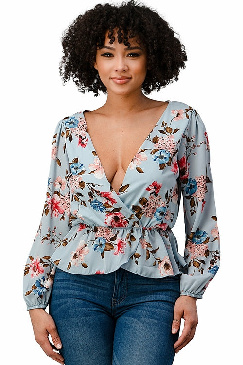 Blusa con dobladillo peplum y sobrepelliz estampada