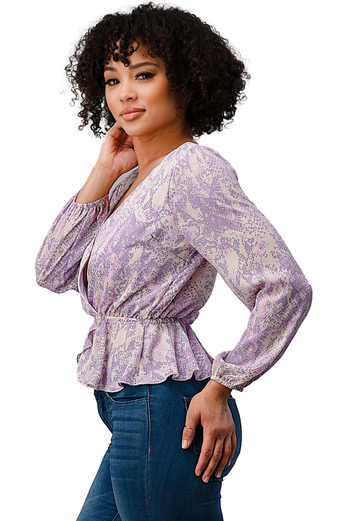 Blusa con dobladillo peplum y sobrepelliz estampada