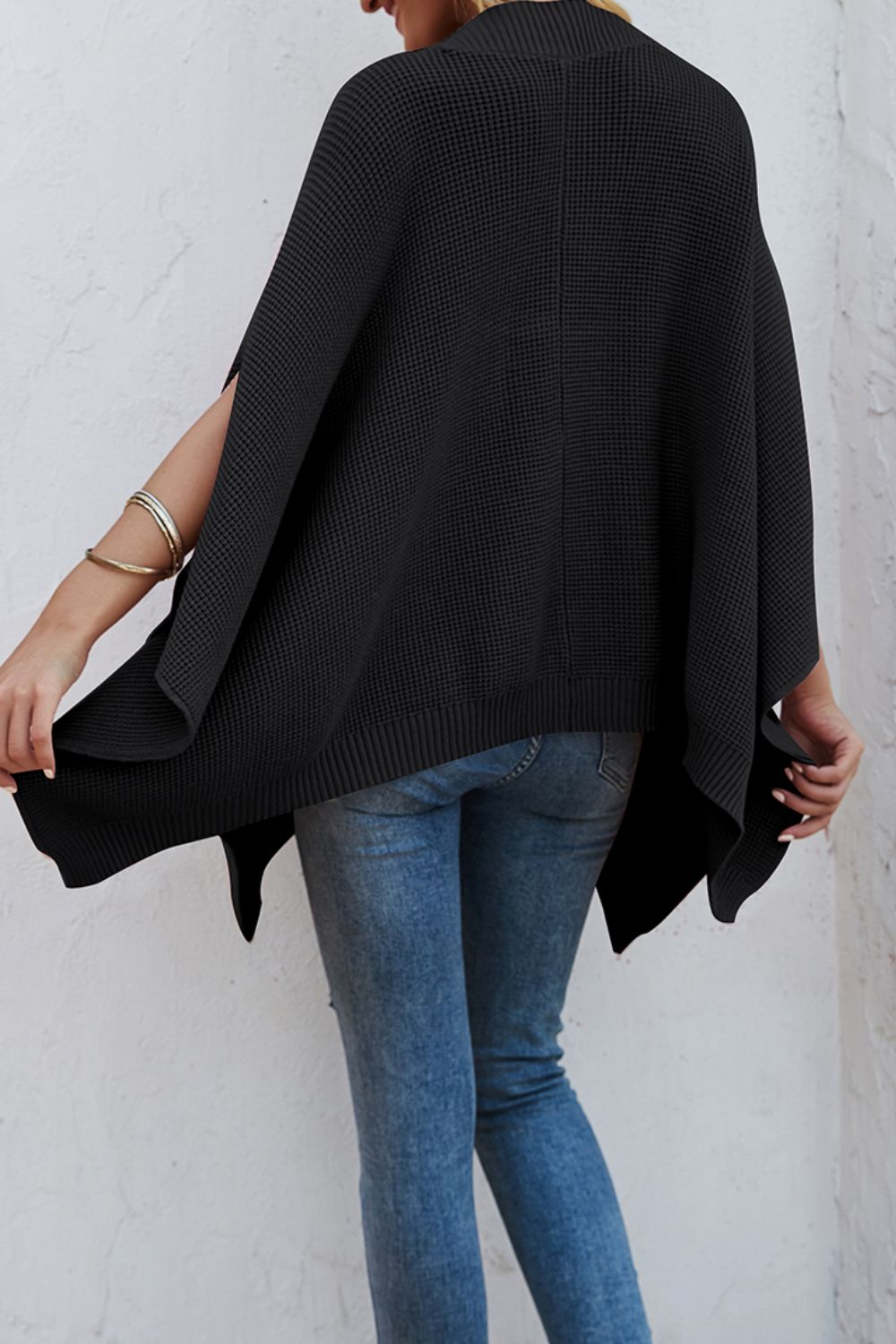 Pull à manches cape et poches en tricot gaufré