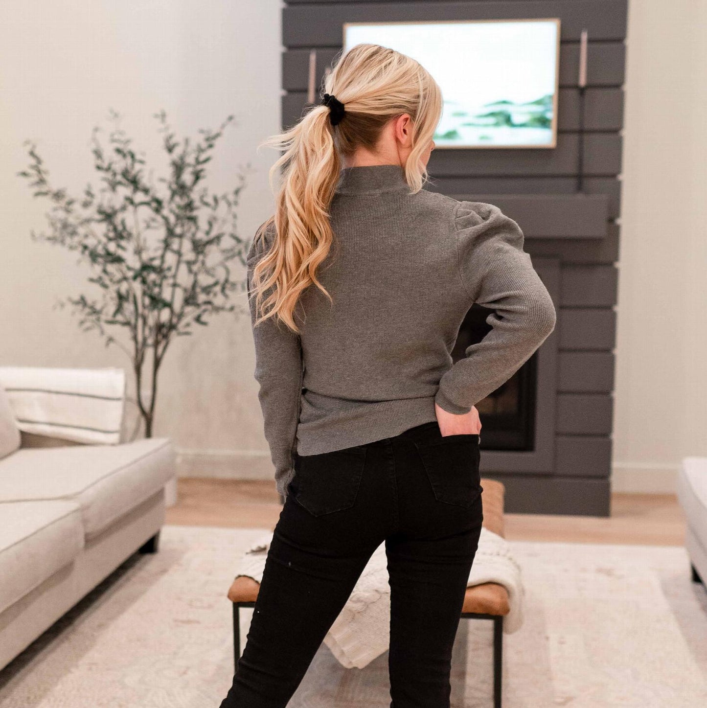 Pull à manches bouffantes et col montant pour femme