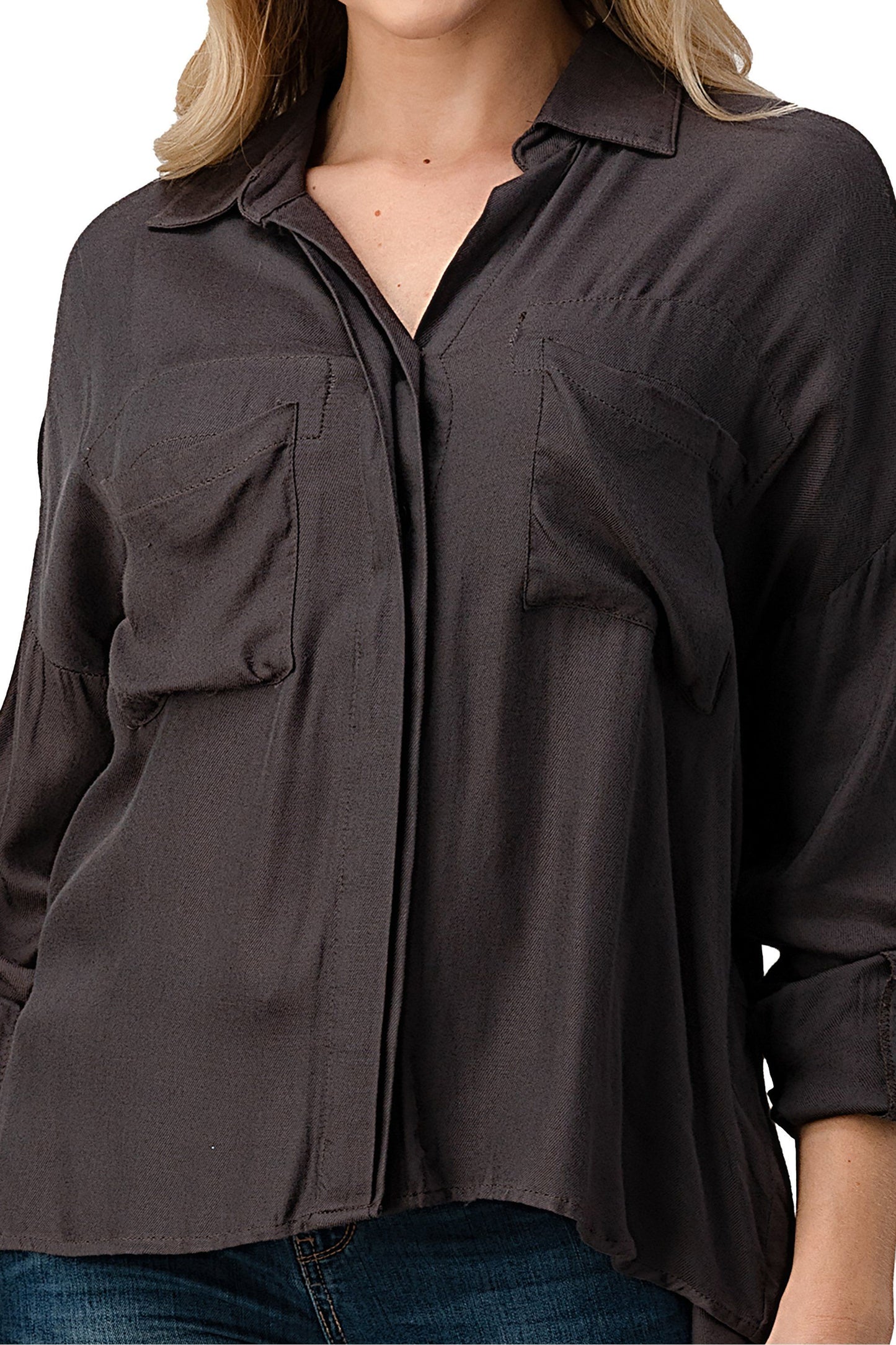 Camisa oversize con botones y bolsillos delanteros