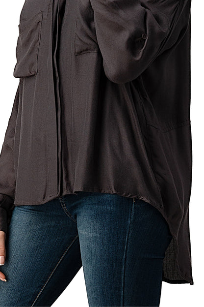 Camisa oversize con botones y bolsillos delanteros