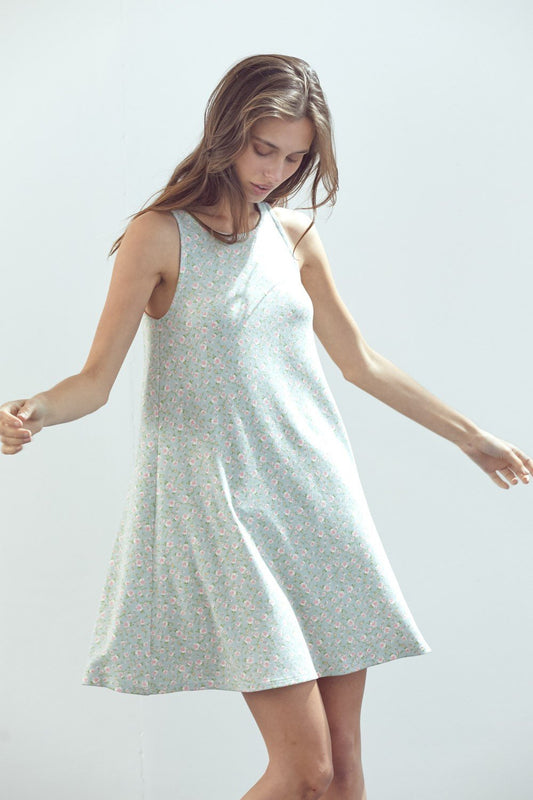 Robe courte trapèze sans manches en maille fleurie marguerite