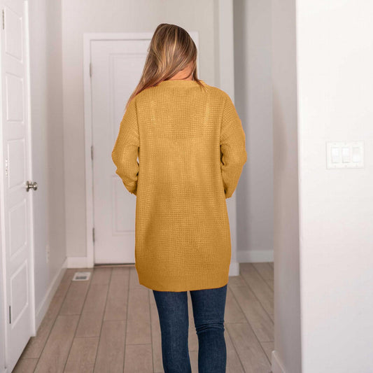 Pull cardigan ouvert à manches longues et poches en tricot gaufré