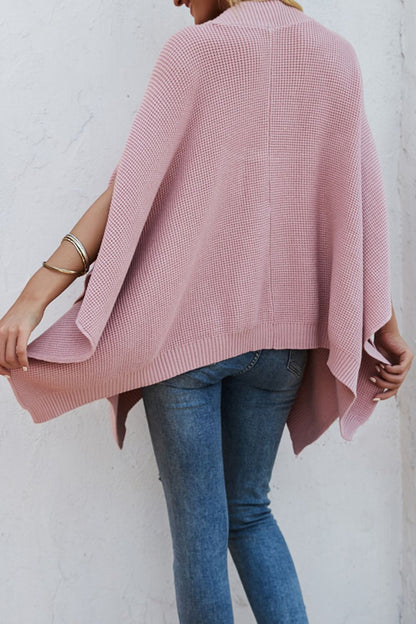 Pull à manches cape et poches en tricot gaufré