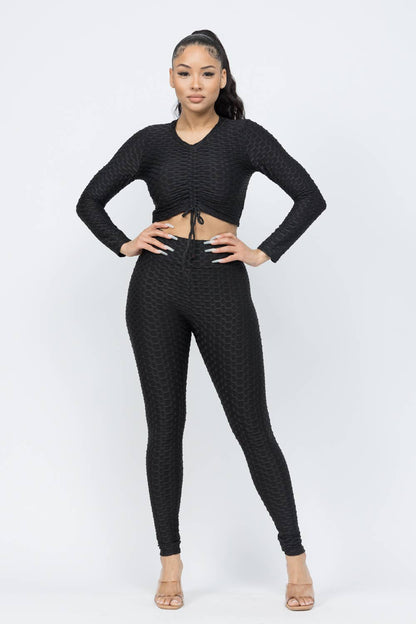 Conjunto de top y leggings con lazo fruncido en nido de abeja