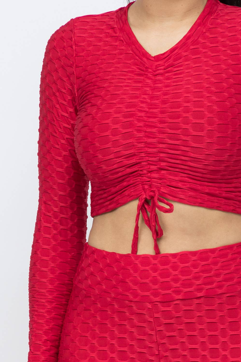 Conjunto de top y leggings con lazo fruncido en nido de abeja