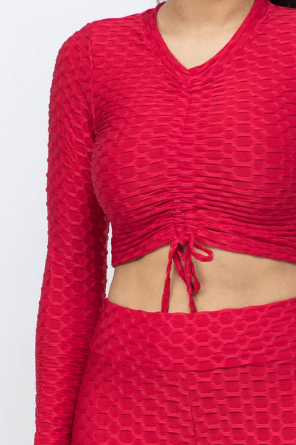 Conjunto de top y leggings con lazo fruncido en nido de abeja