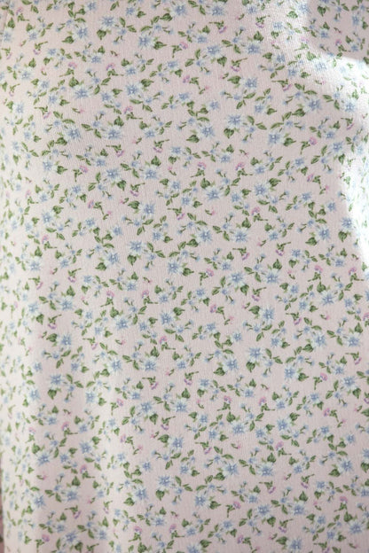Robe courte trapèze sans manches en maille fleurie marguerite