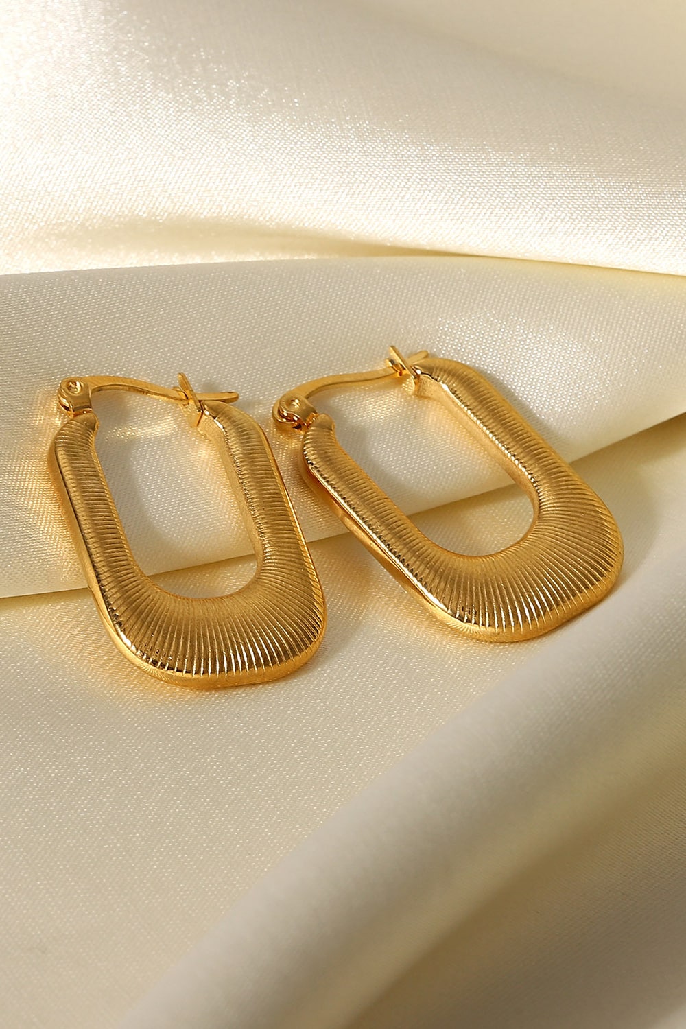 Boucles d'oreilles porte-bonheur en forme de U