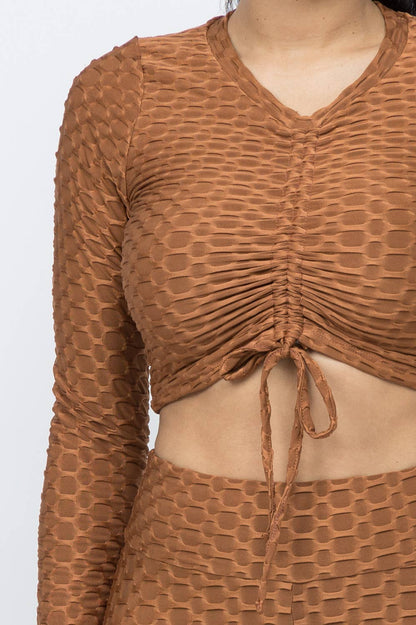 Conjunto de top y leggings con lazo fruncido en nido de abeja