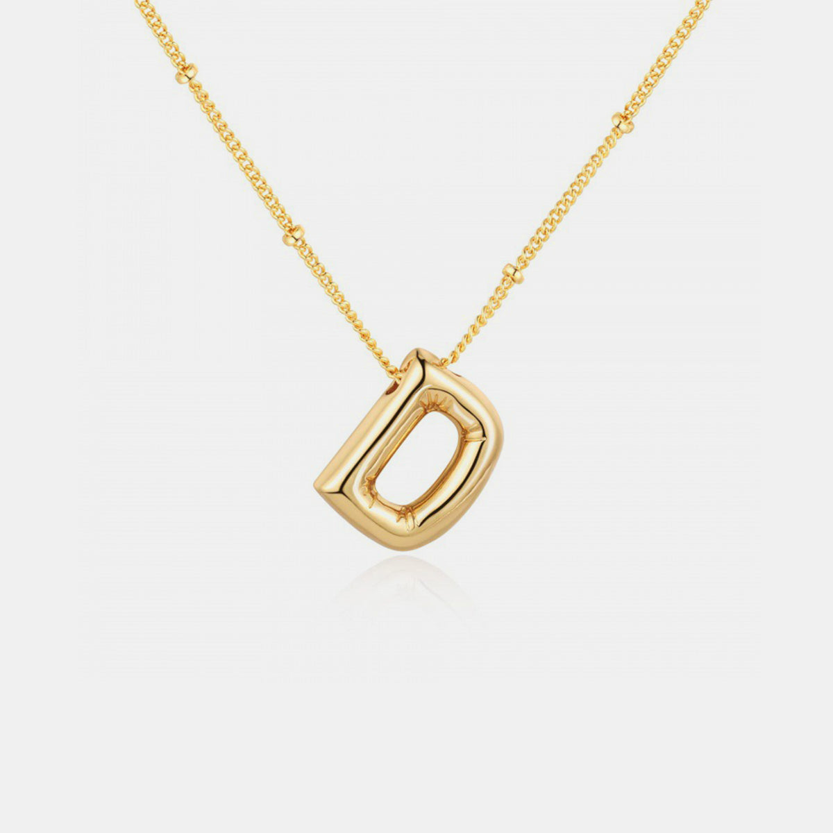 Collier pendentif lettre plaqué or