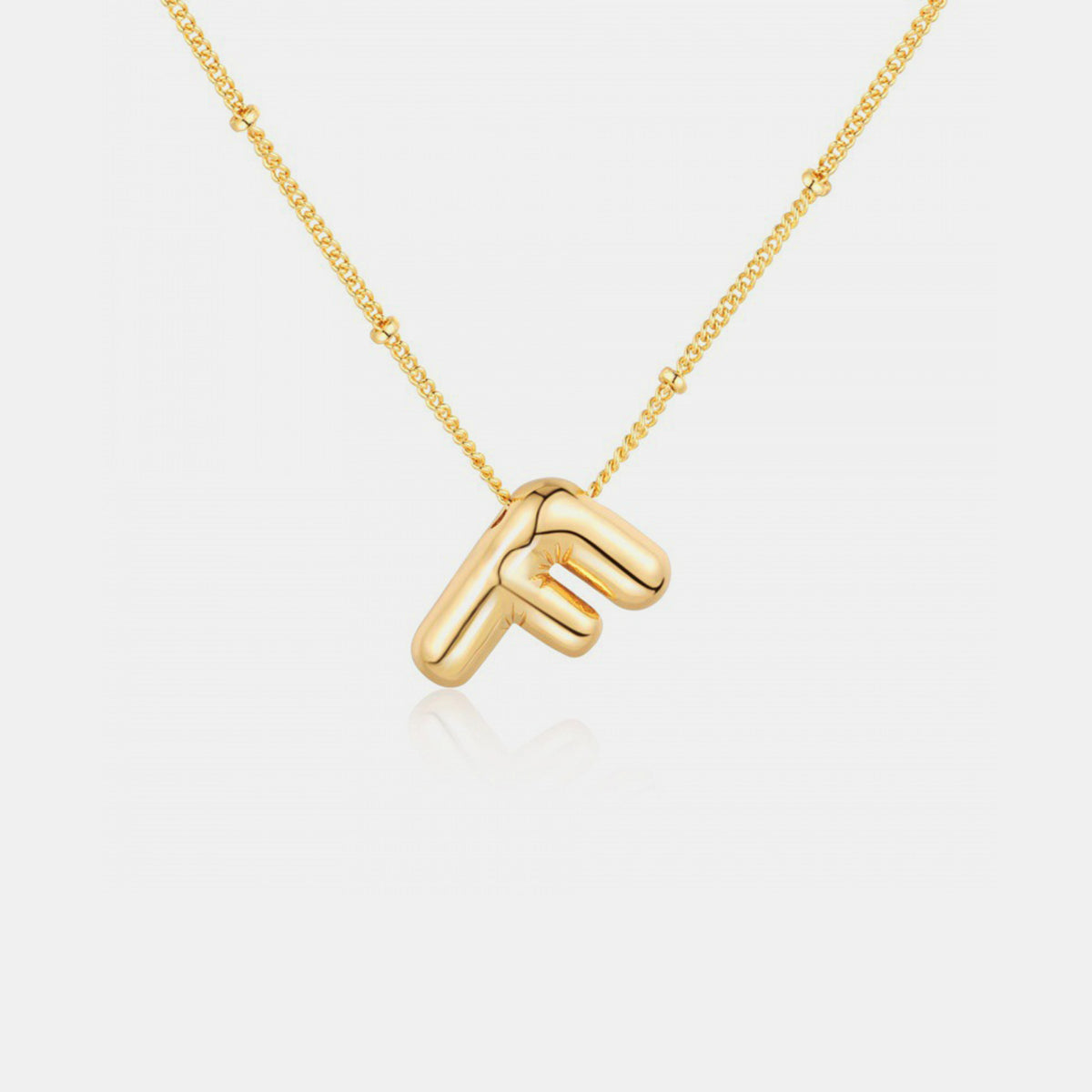 Collier pendentif lettre plaqué or