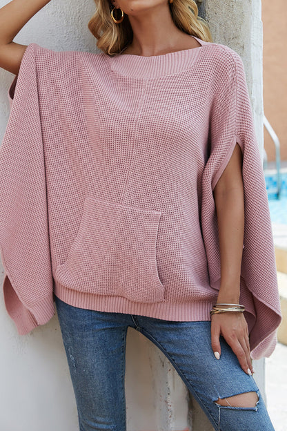 Pull à manches cape et poches en tricot gaufré
