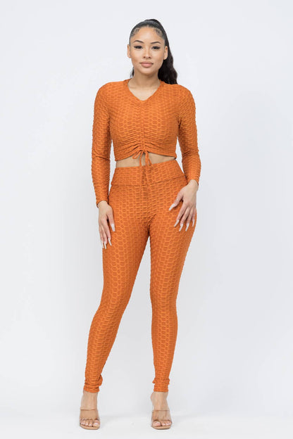 Conjunto de top y leggings con lazo fruncido en nido de abeja