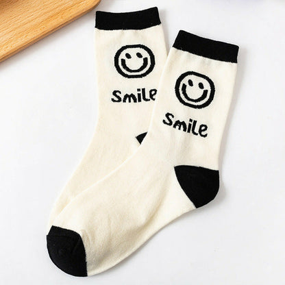 Chaussettes pour femmes avec visage souriant