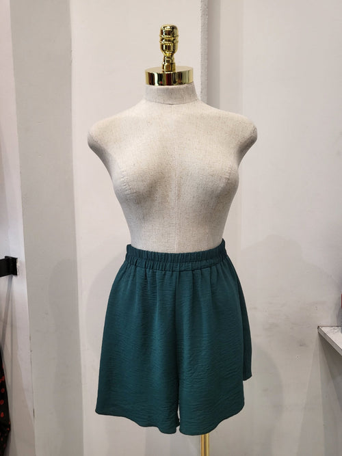 Shorts rosas texturizados de cintura alta con cinturilla elástica