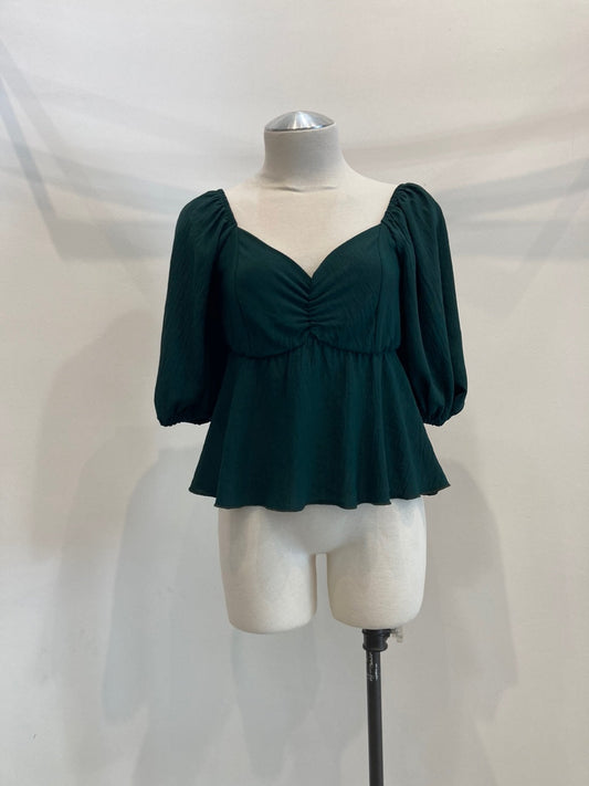 Blusa peplum fruncida