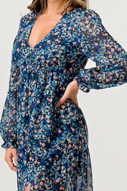 Vestido largo con mangas largas y abertura lateral