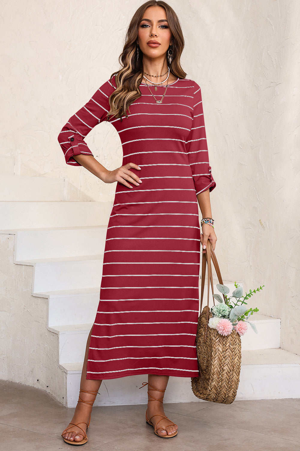 Robe mi-longue rayée fendue à col rond
