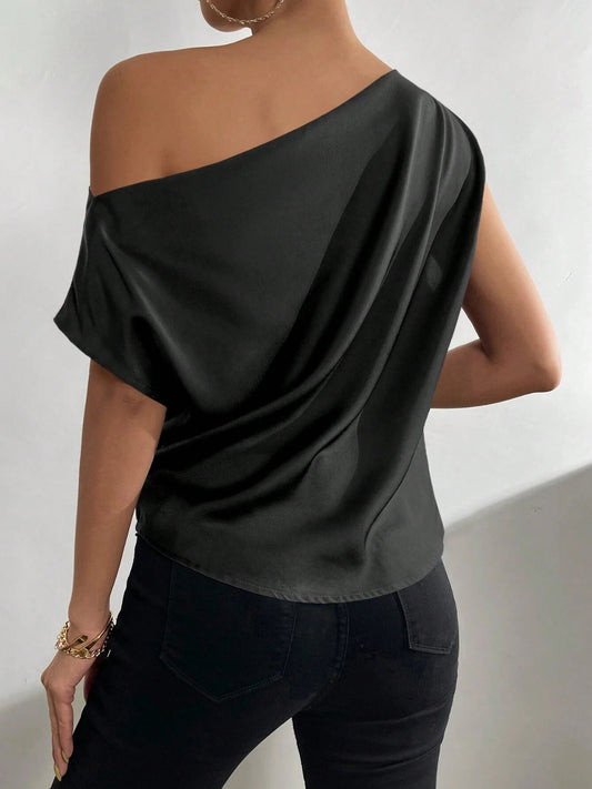 Blusa fruncida de un solo hombro