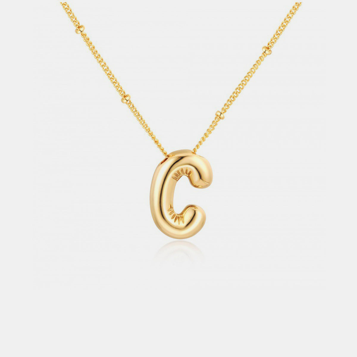 Collier pendentif lettre plaqué or