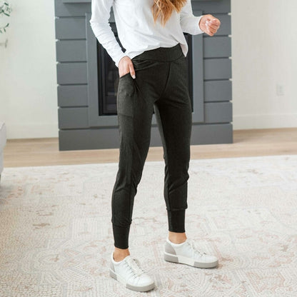 Pantalones deportivos ajustados y sólidos con bolsillos