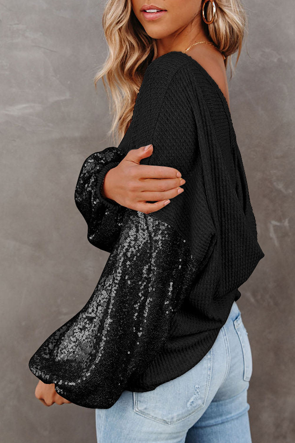 Blusa de punto gofre con lentejuelas