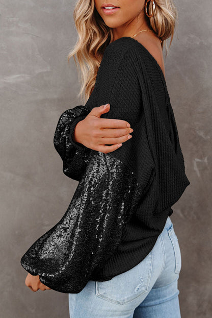Blusa de punto gofre con lentejuelas