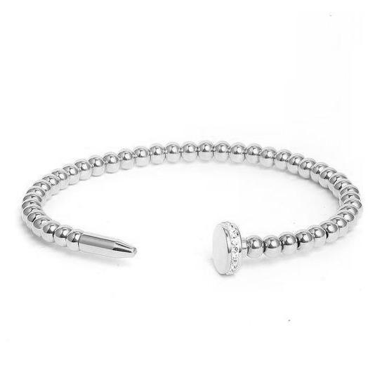 Bracelet à clous perlé
