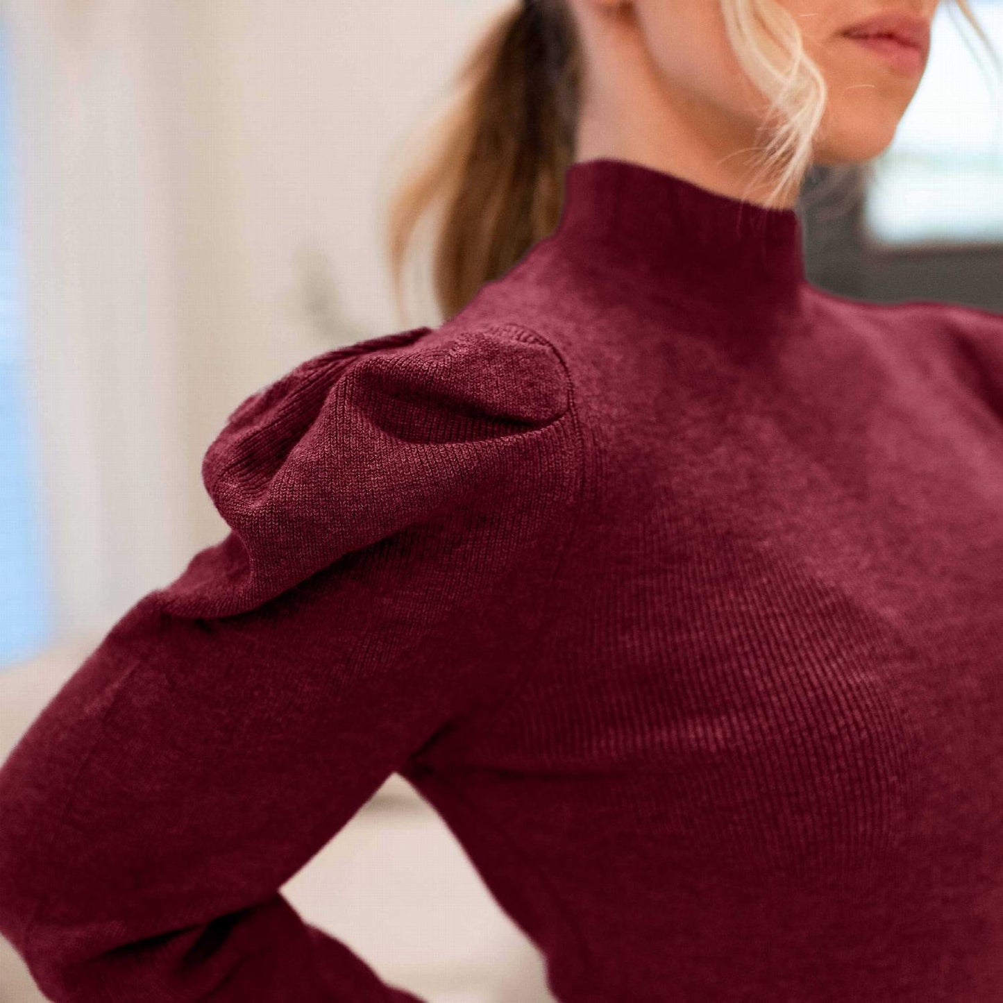 Pull à manches bouffantes et col montant pour femme